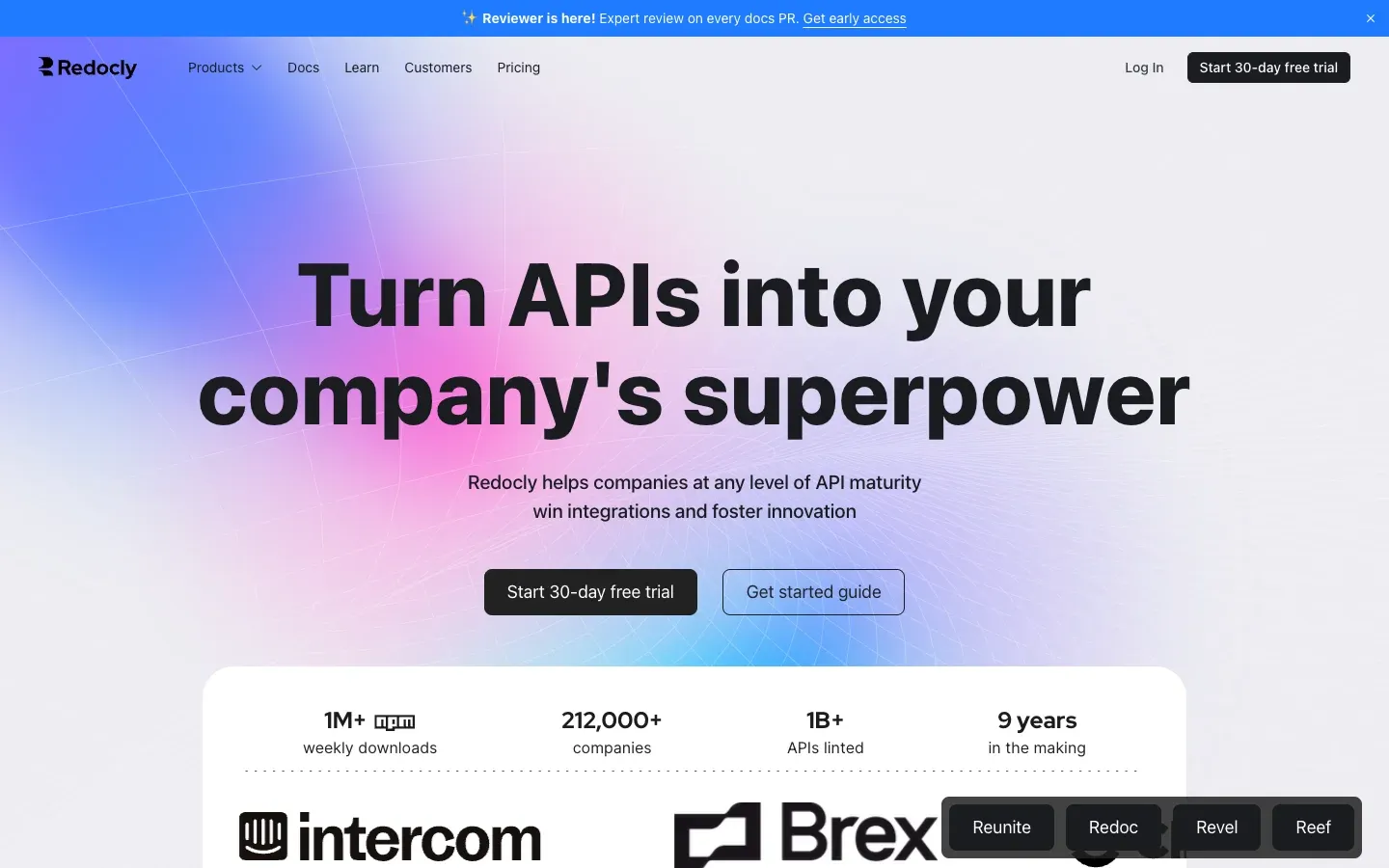The Redocly homepage, headlined "Turn APIs into your company's superpower", with adoption statistics and customer logos below the fold